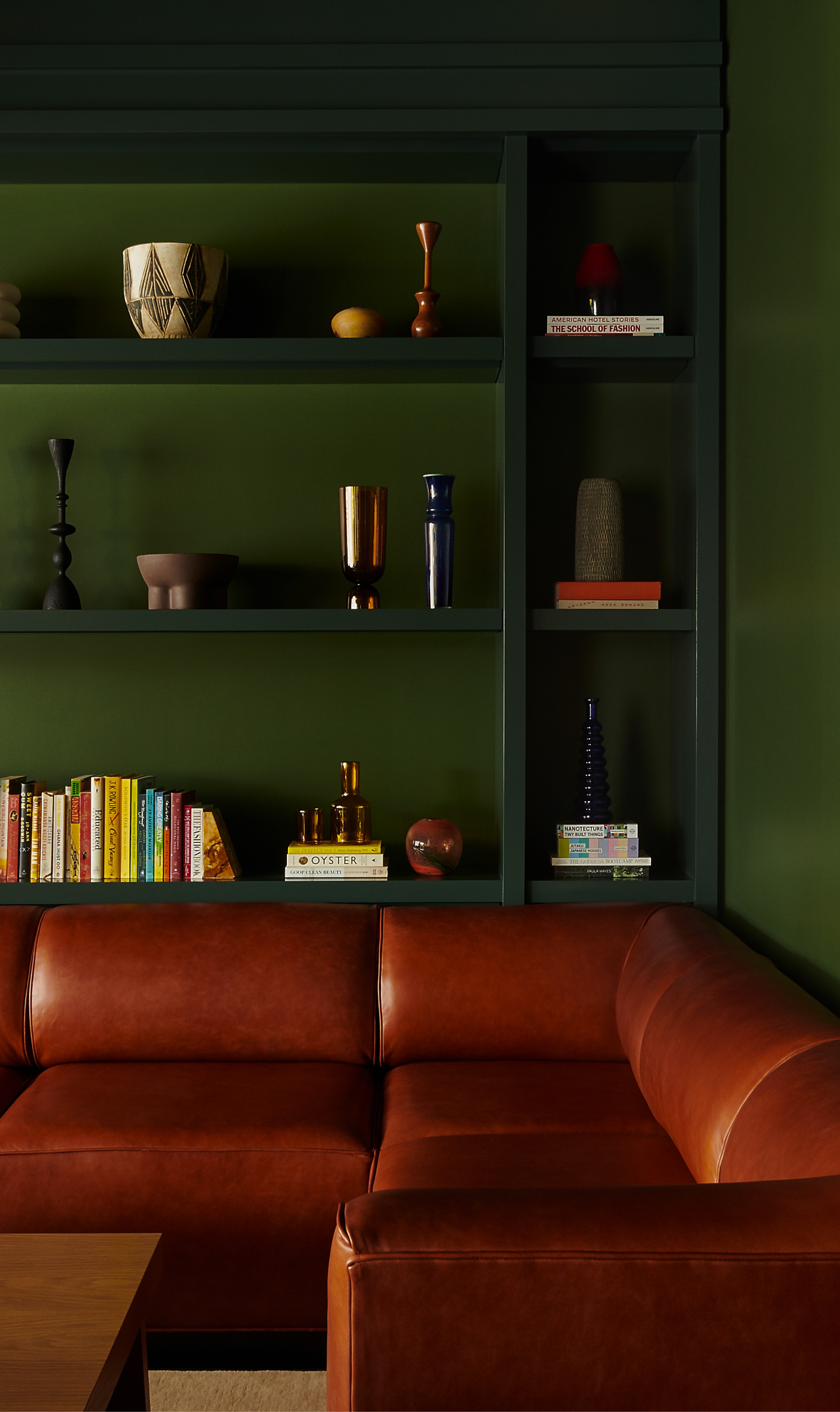 The interior of a Chief flagship showing a sofa and a shelf.